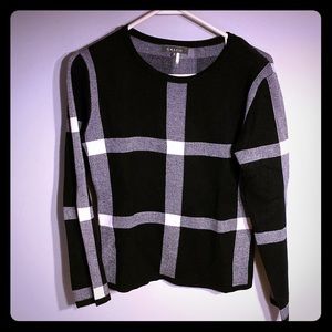Black and white women’s sweater. Size S